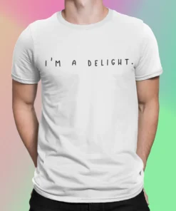 Mockup Of A Man Wearing A Customizable T Shirt Against A Plain Color Backdrop 1422 El 5.webp