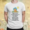 Mockup Of A Man Wearing A Customizable T Shirt Against A Plain Color Backdrop 1422 El 9.webp